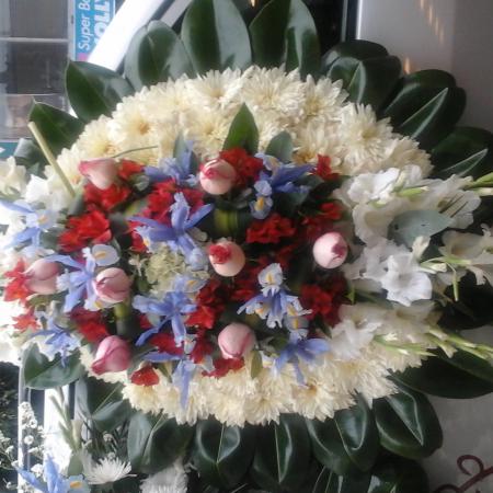 Corona moña al medio tonos rojos