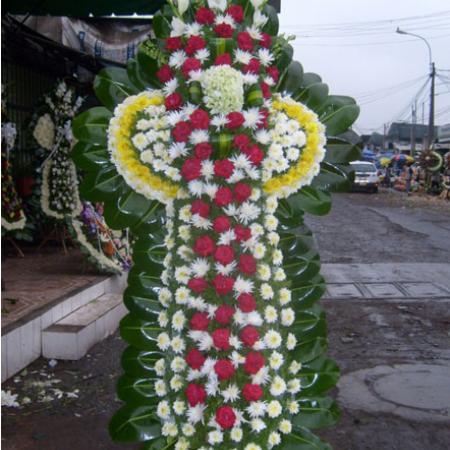Cruz tonos amarillos y rojos