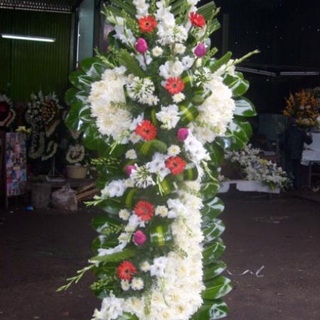 Cruz moña de lado de colores